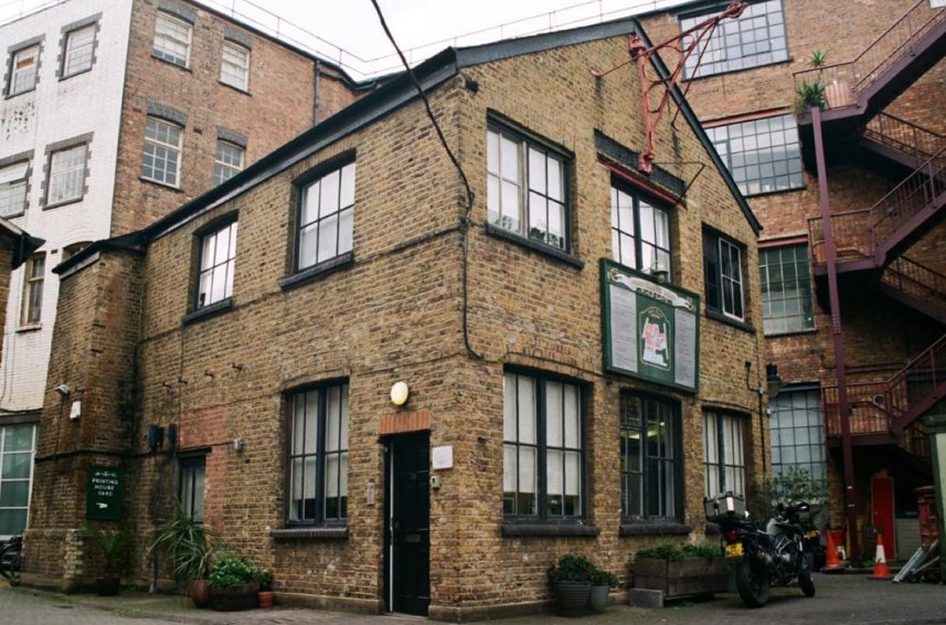 The Chan Photo Lab building, a brick printing house in a London courtyard