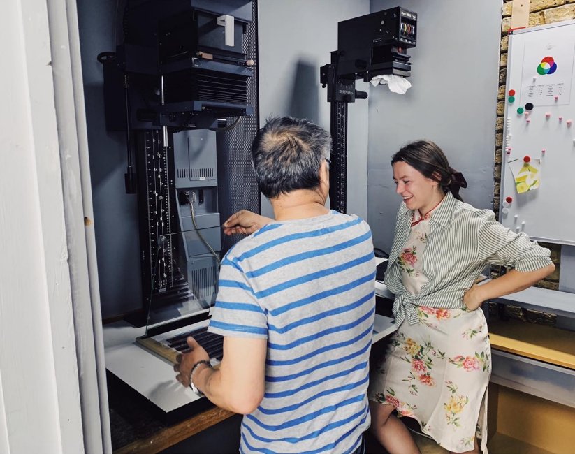 Working on a print together at an enlarger in one of the darkrooms